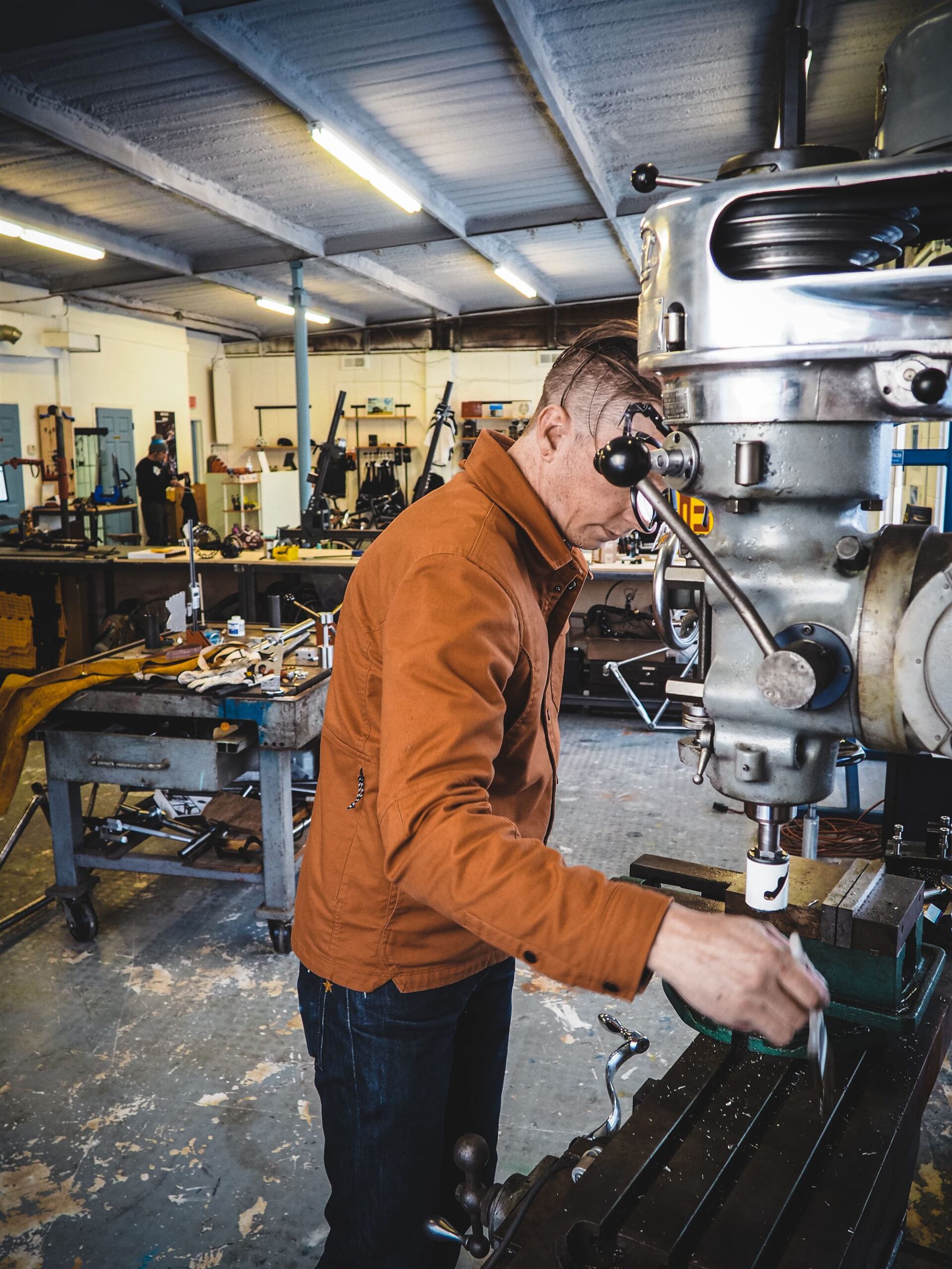 Michael Crum machining at the Bridgeport mill in the Magnolia Cycles workshop